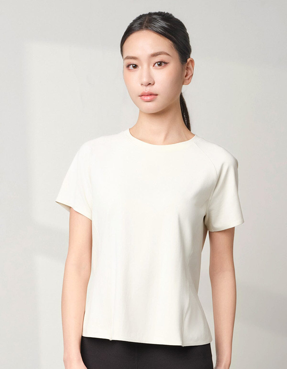 Her own words SPORTS HOW-EFFORTLESS Regular Short Sleeve Yoga Top. A soft, buttery-feel athletic top featuring LYCRA ADAPTIV® high-stretch technology, curved back hem with side slits for fluid movement, and a flattering, unforced fit.
