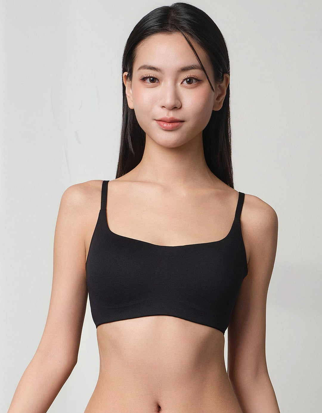 A model is wearing black Soft Flexi Square Neck Non Wired Bra Bra 
