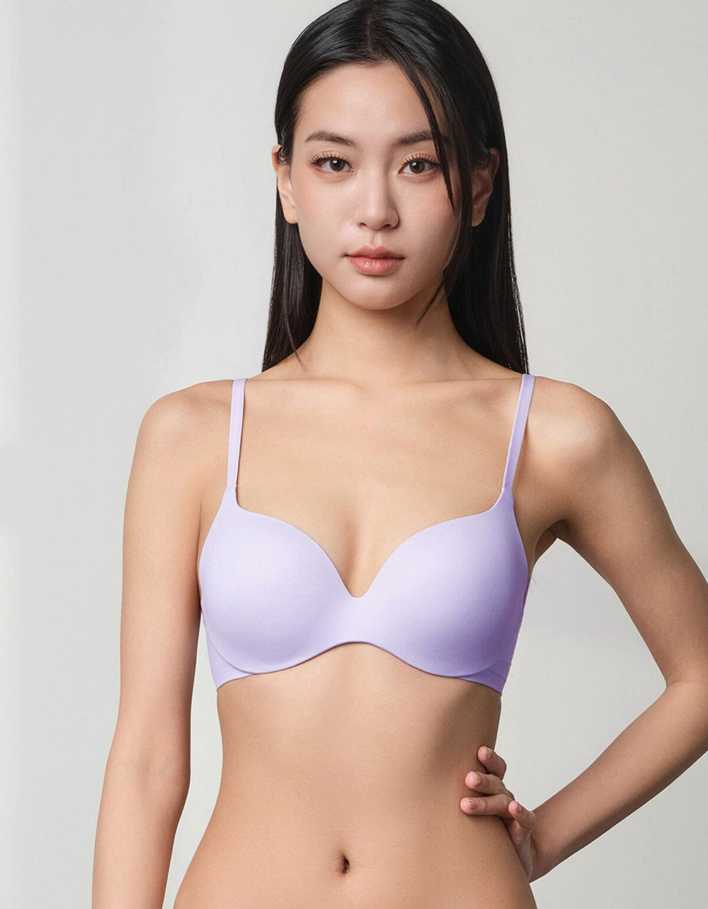 A girl is wearing a purple SIGNATURE Lightly Lined Bra from Her own words 