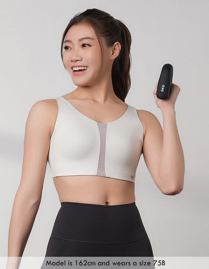 HOW-CONTROLLED REmatrixPad™ & REwickMax™ Breathable High Impact Sports Bra High Impact Her own words SPORTS 