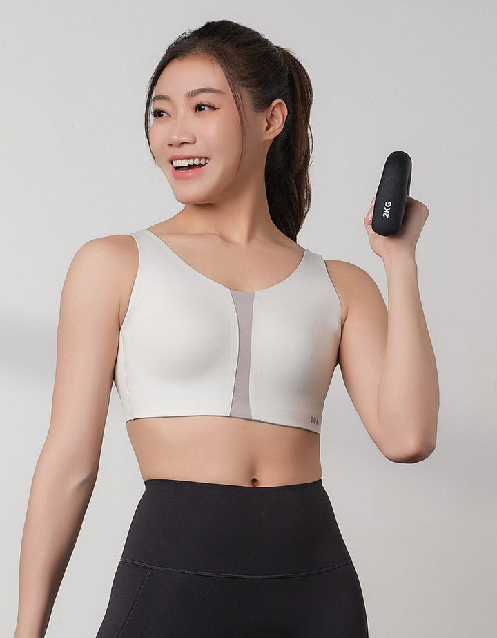 HOW-CONTROLLED REmatrixPad™ & REwickMax™ Breathable High Impact Sports Bra High Impact Her own words SPORTS 